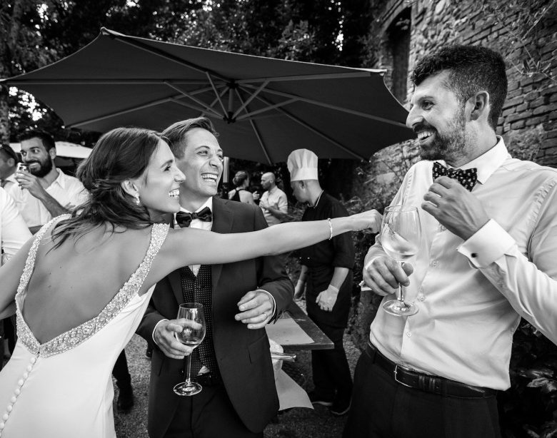 grayscale photo of man and woman kissing